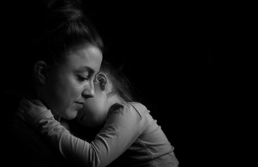 Adoptive Mother Hugging Daughter